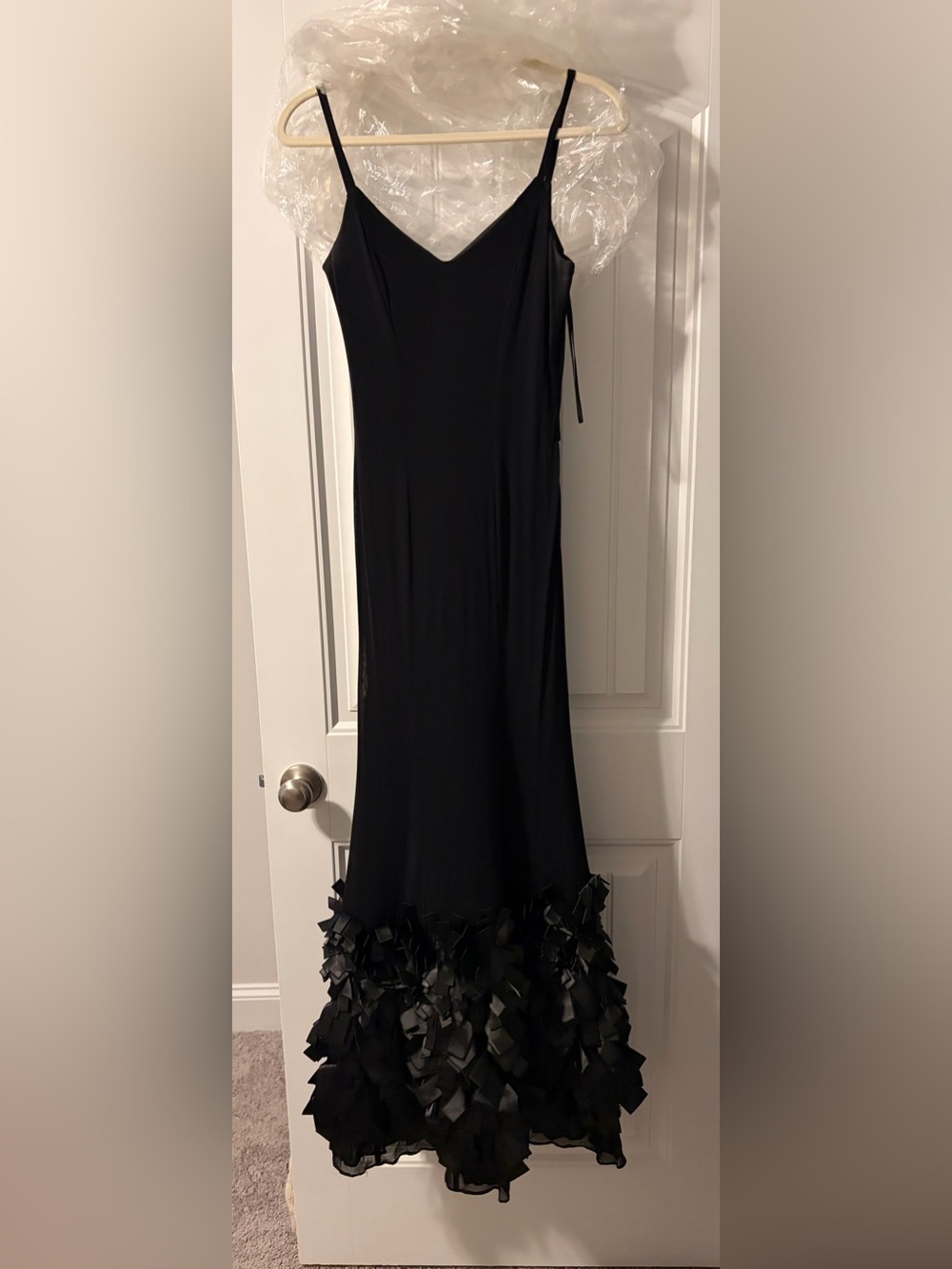 Elegant Black Dress with Silk Bow Hem